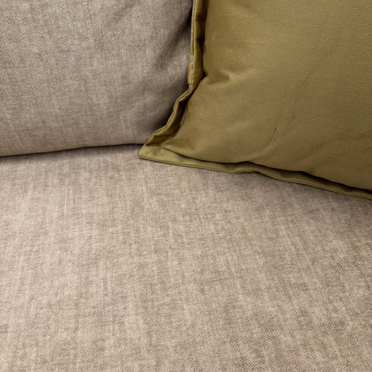 Close-up shot of the beige Vogue velvet fabric on the Chelsea snuggler, showing the premium textile weave and high-quality finish.