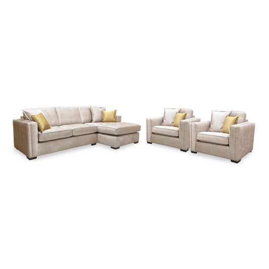 Chelsea beige velvet corner chaise sofa with the two snuggler chairs from the set, angled with chairs on the right