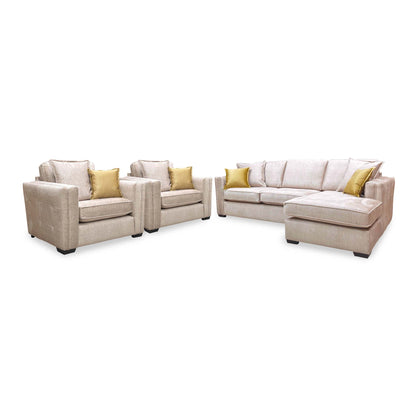 Chelsea beige velvet set angled with the two snuggler chairs on the left and the corner chaise on the right