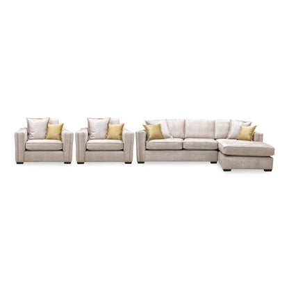 Front view of the Chelsea beige velvet set, two snuggler chairs beside the right hand chaise sofa