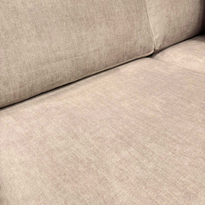 Close-up of the beige Vogue velvet fabric on the Chelsea sofa seat and back cushions