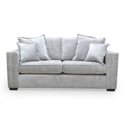 Front view of the Chelsea 3-seater sofa, showcasing the warm truffle-toned fabric and modern English arm design.