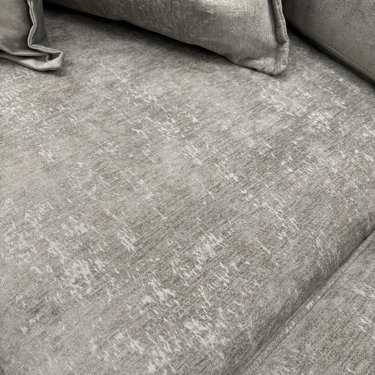 Detailed view of the Meridian Truffle soft weave fabric, highlighting the intricate textile pattern and neutral color tone.