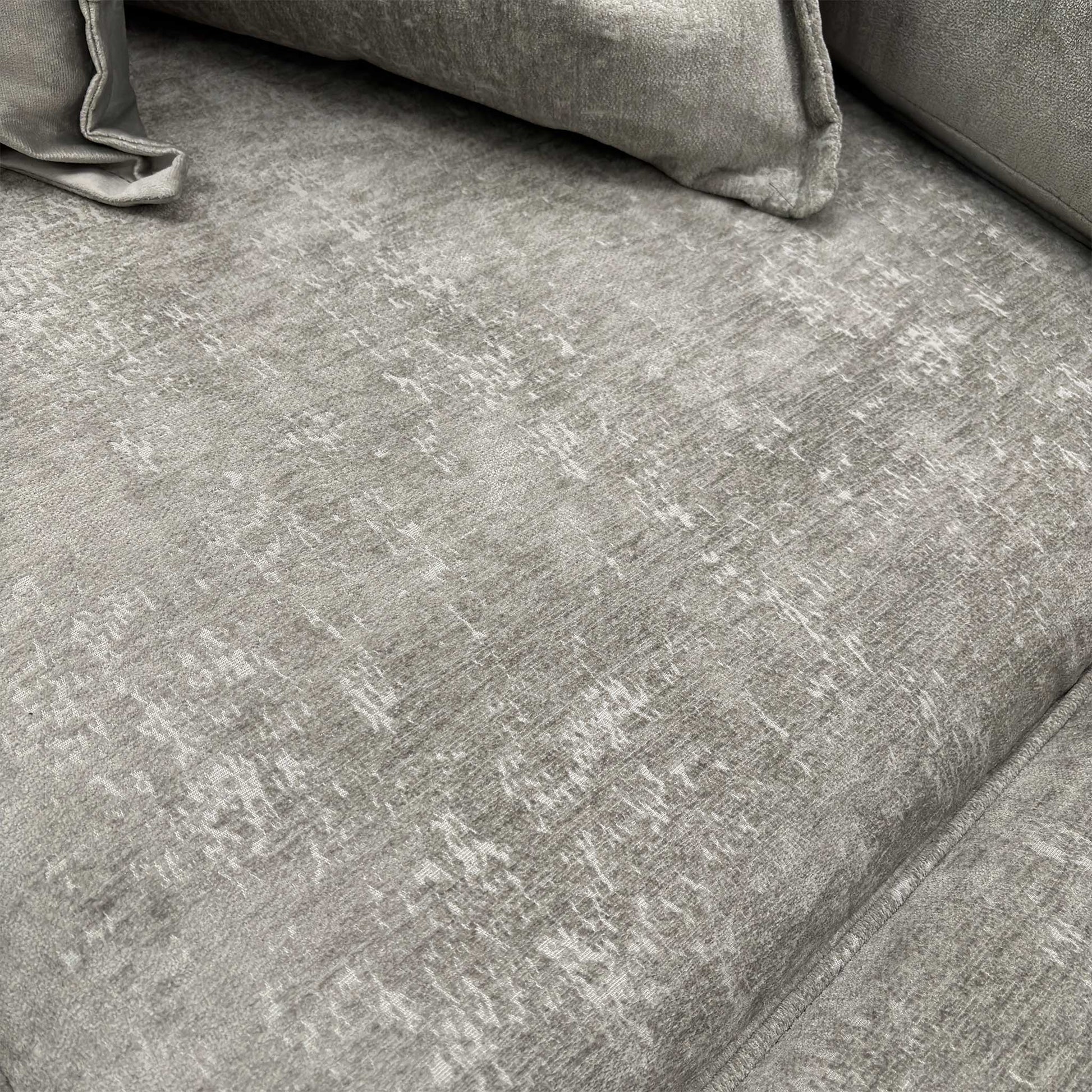 Detailed view of the Meridian Truffle soft weave fabric, highlighting the intricate textile pattern and neutral color tone.