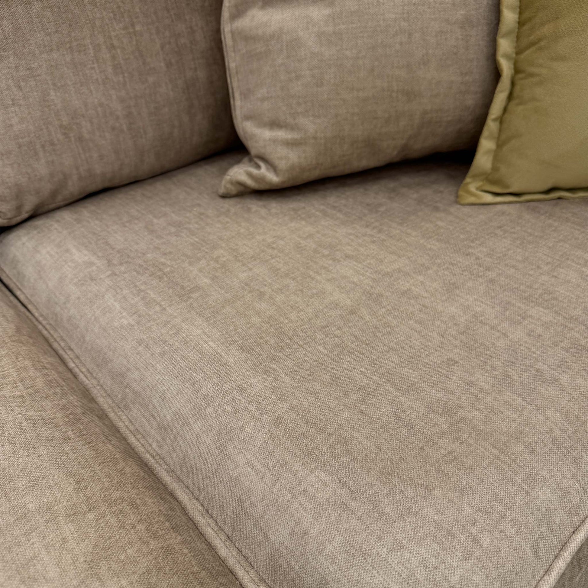 Close-up of the beige Vogue velvet fabric, focusing on the soft-touch texture and subtle reflective quality of the material.