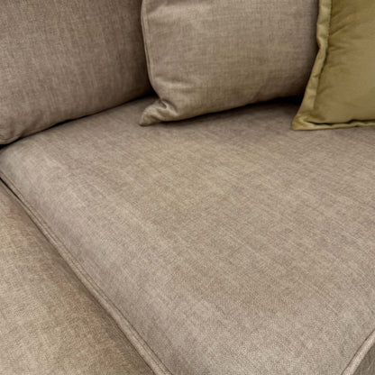 Close-up of the beige Vogue velvet fabric, focusing on the soft-touch texture and subtle reflective quality of the material.