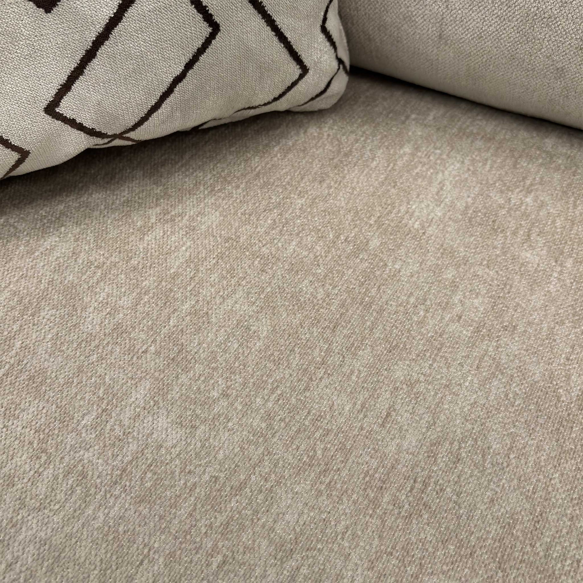 Close-up of the Truffle Derwent soft weave fabric, illustrating the premium texture and neutral color palette of the Harvey sofa.