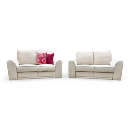 Front view of the DFS ‘Orka’ 2+2 Seater Sofa Set in Cream Plaza Linen fabric, featuring two matching 2-seater manual recliner sofas.