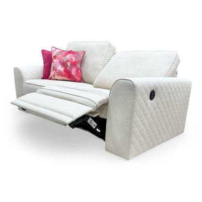Side profile of the ‘Orka’ sofa, illustrating the well-padded armrests and contemporary silhouette.