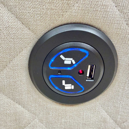 Close-up of the power recliner controls on the side of the sofa, featuring a convenient button for easy adjustment.