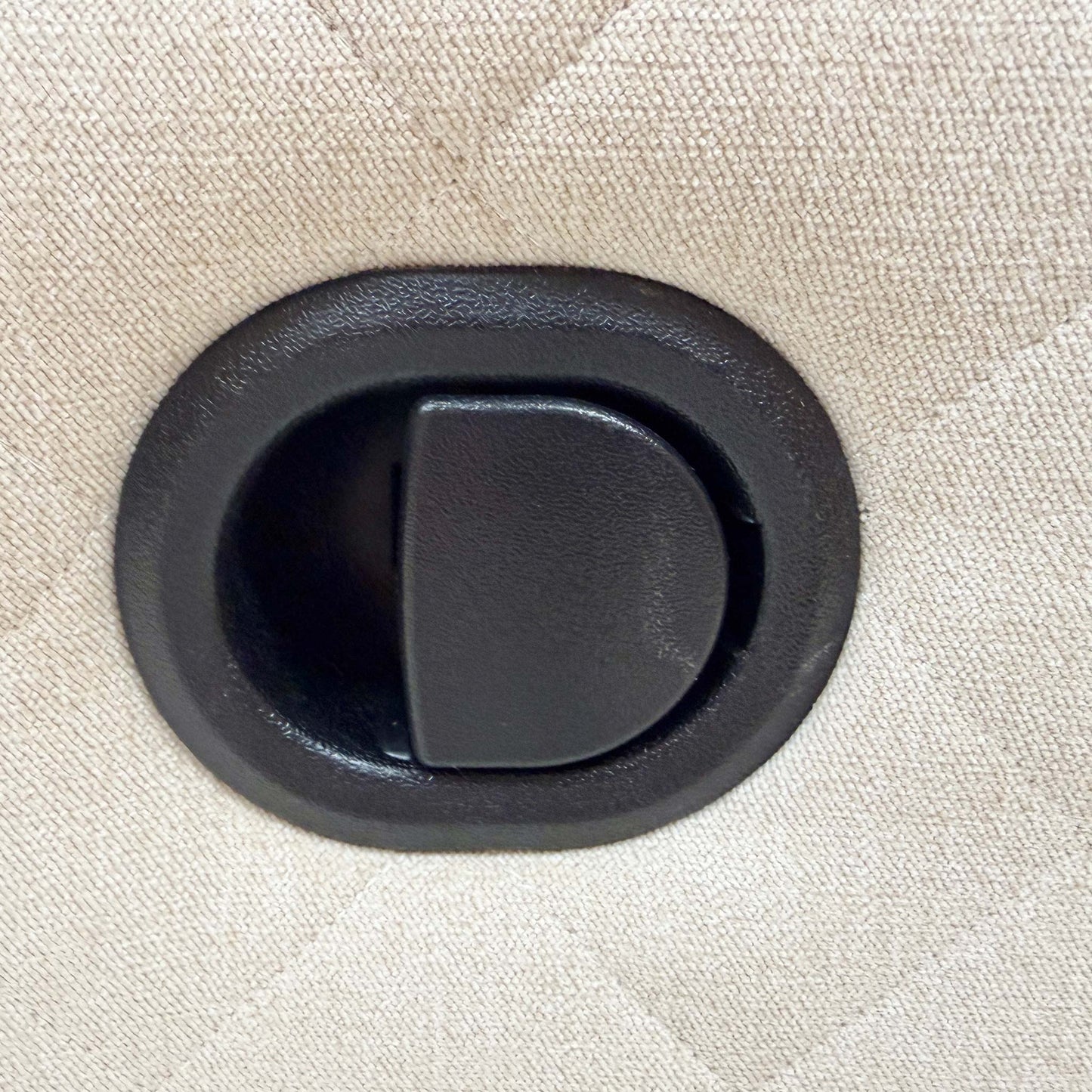 Close-up of the recliner handle and mechanism, highlighting the ease of use for effortless relaxation.