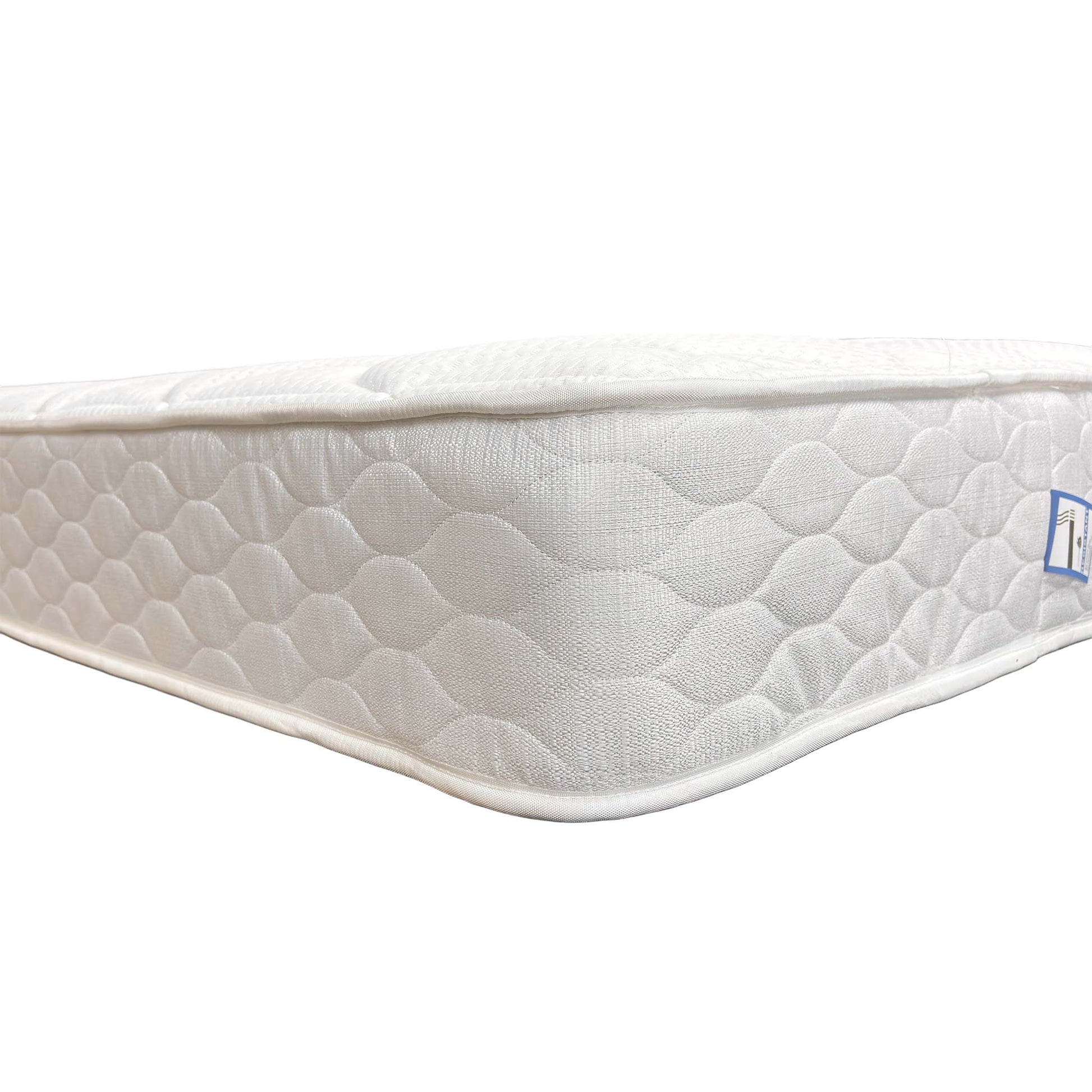 Detailed shot of the mattress corner and edge support, illustrating the durable construction of the Silentnight Miracoil range.