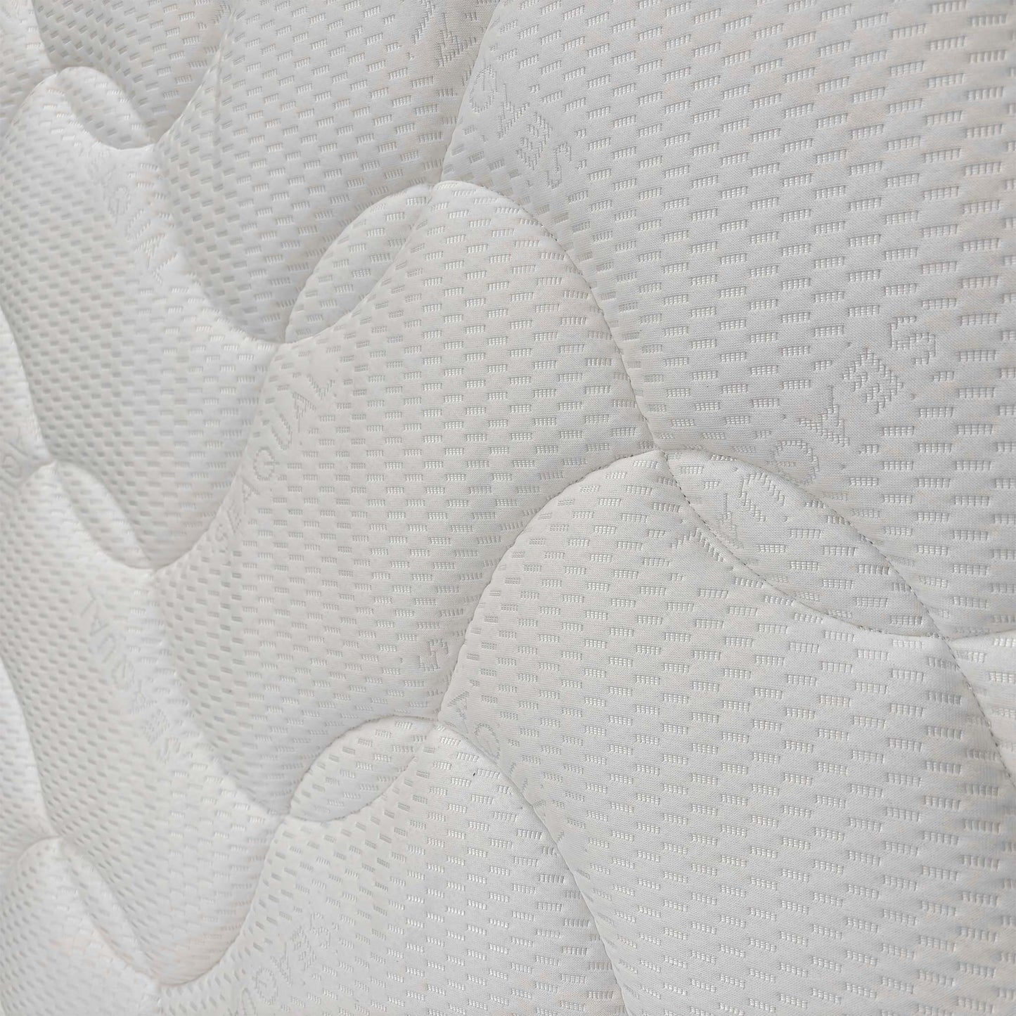 Close-up of the quilted mattress surface, detailing the high-quality fabric texture designed for comfort and airflow.