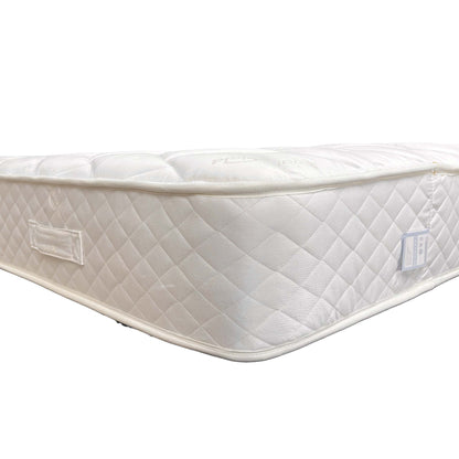 Close-up of the mattress corner, showcasing the official Silentnight branding and the premium knit fabric texture.
