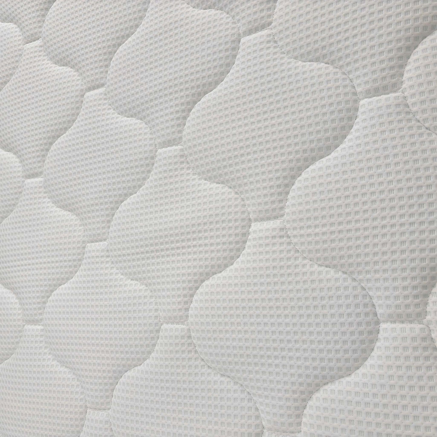 Close-up of the mattress surface, showcasing the breathable "Cool-To-Touch" fabric and the intricate quilted pattern of the top layer.