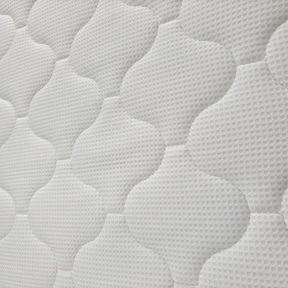 Close-up of the mattress surface, showcasing the breathable "Cool-To-Touch" fabric and the intricate quilted pattern of the top layer.