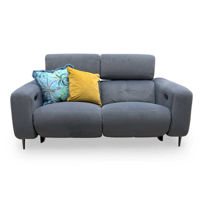 Full frontal view of the Fabb 'Ezra' 2-seater sofa in a neutral studio setting, highlighting its elegant and versatile appearance.