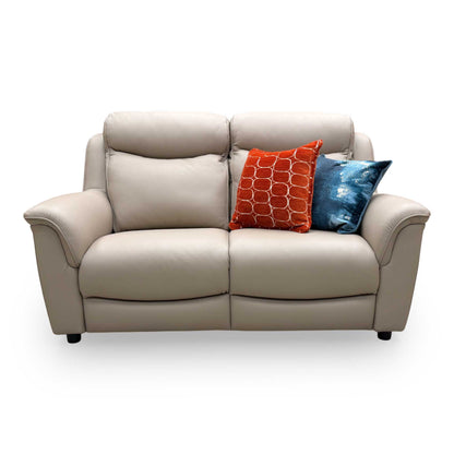 Front view of the 'Manhattan' sofa, illustrating the sleek, compact frame and modern armrest design, ideal for smaller spaces.