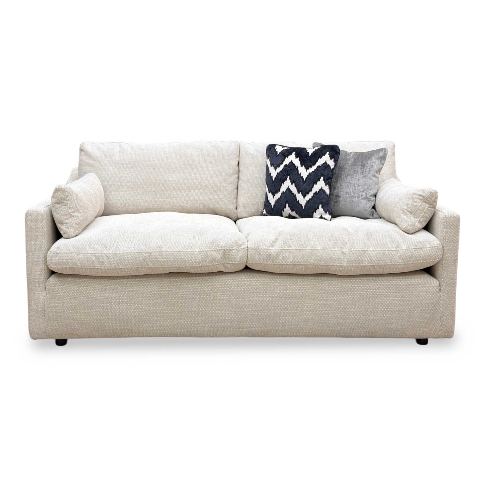 Front view of showcasing the Dream 2 seater sofa in a cozy, traditional interior.