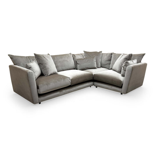 Front view of the Ashley Manor 'Ponti' corner sofa in luxurious mink velvet, showcasing its contemporary L-shaped design and clean lines.