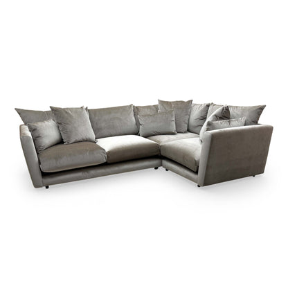 Side angle of the 'Ponti' mink velvet corner sofa, highlighting the generous seating area and elegant velvet upholstery.