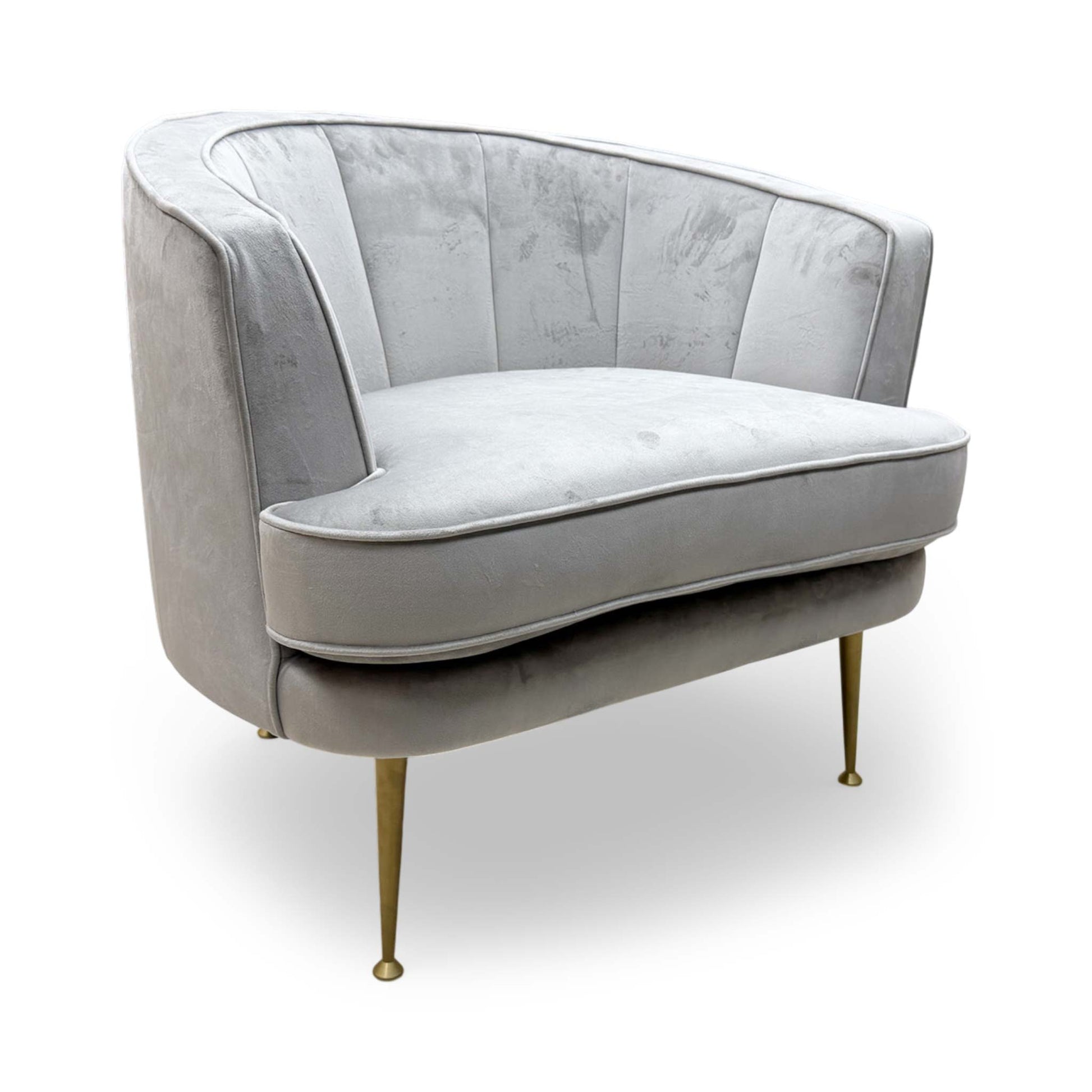 Full view of the DFS ‘Enchanted’ Accent Chair in silver sensual velvet, featuring a modern curved back and plush upholstered finish.