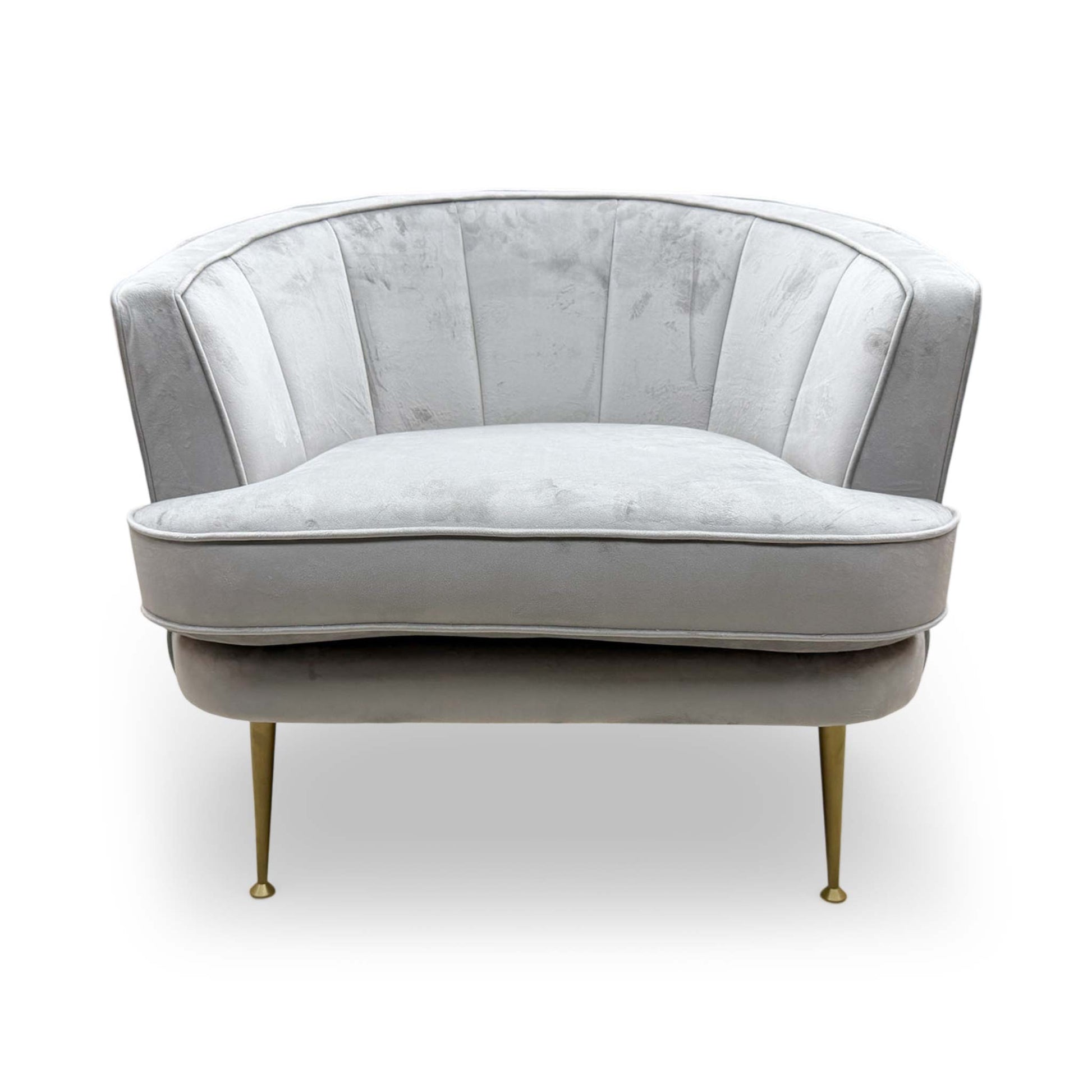 Front view of the DFS ‘Enchanted’ Accent Chair in silver sensual velvet, featuring a modern curved back and plush upholstered finish.