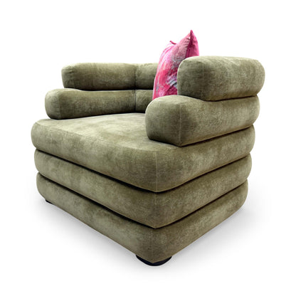 Rear view of the Sofology ‘Stacked’ armchair, emphasizing the clean lines and professional finish of the olive green upholstery.