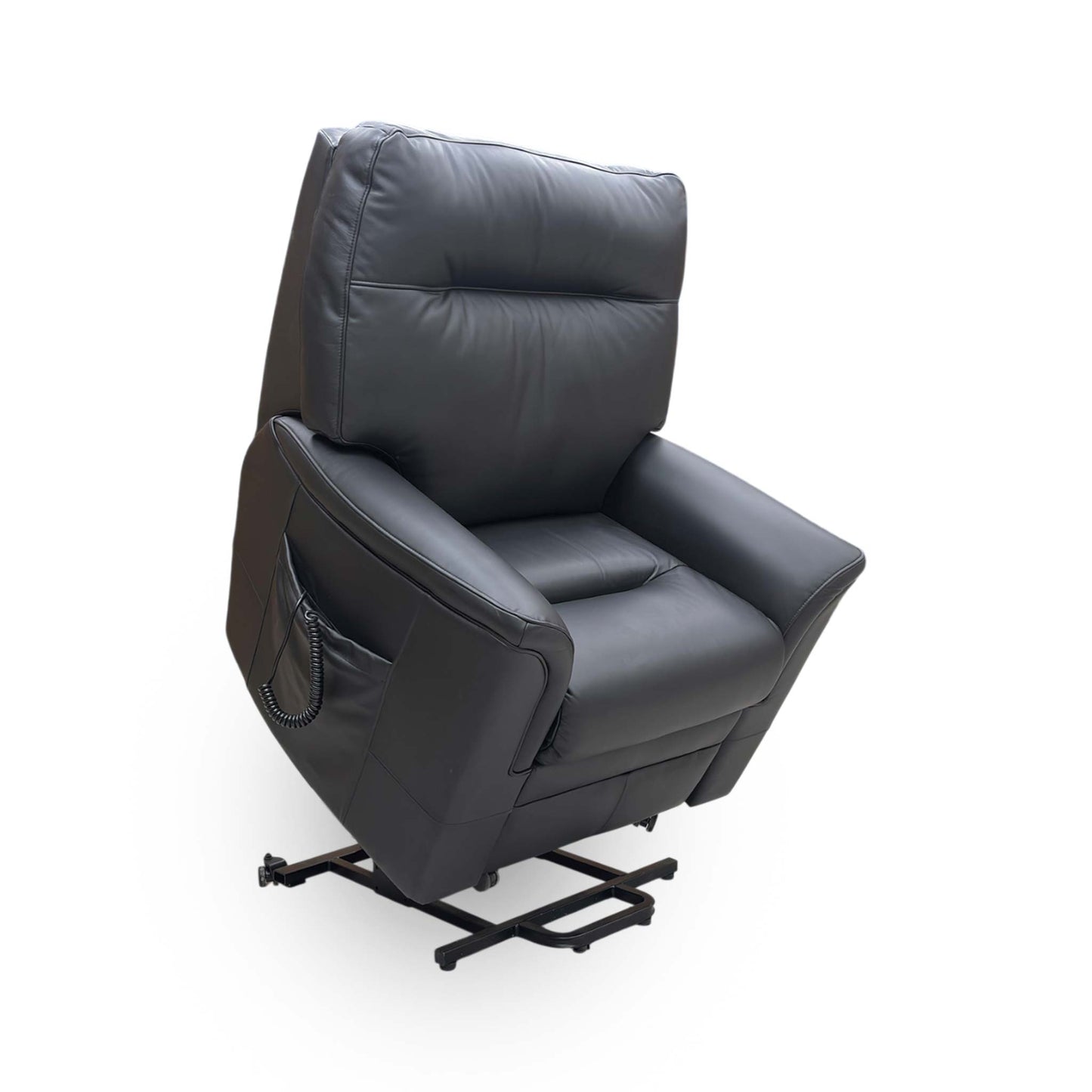 Full view of the Parker Knoll ‘Hudson’ lift and rise armchair in Como Black leather, featuring a classic high-back design and plush cushioning for ultimate comfort.