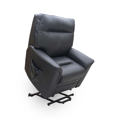 Full view of the Parker Knoll ‘Hudson’ lift and rise armchair in Como Black leather, featuring a classic high-back design and plush cushioning for ultimate comfort.