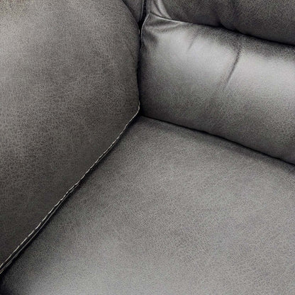 Close-up of the stitching and finish on the charcoal grey fabric armrest.