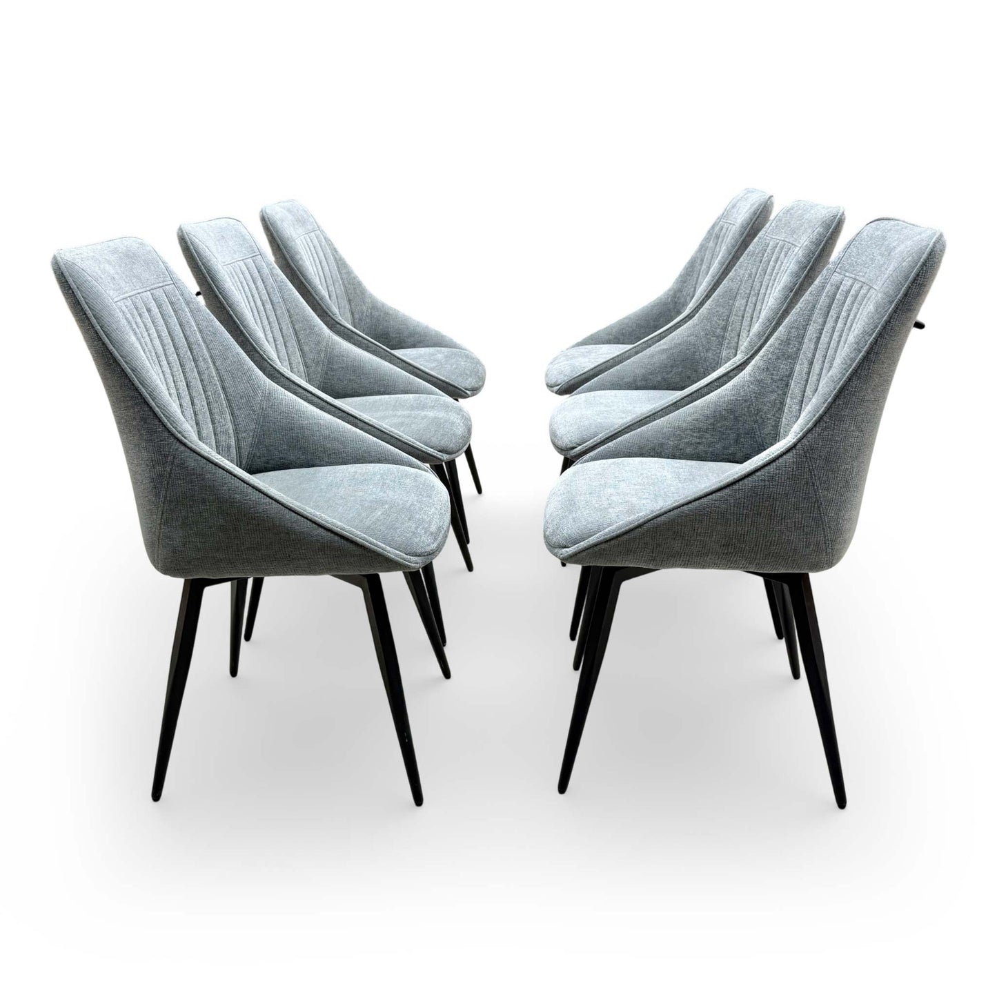 Side profile of the 'Crete' swivel chair showing the ergonomic back curvature and slender metal frame.