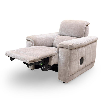 Side profile view of the 'Genius' power recliner, showing the full reclining position.