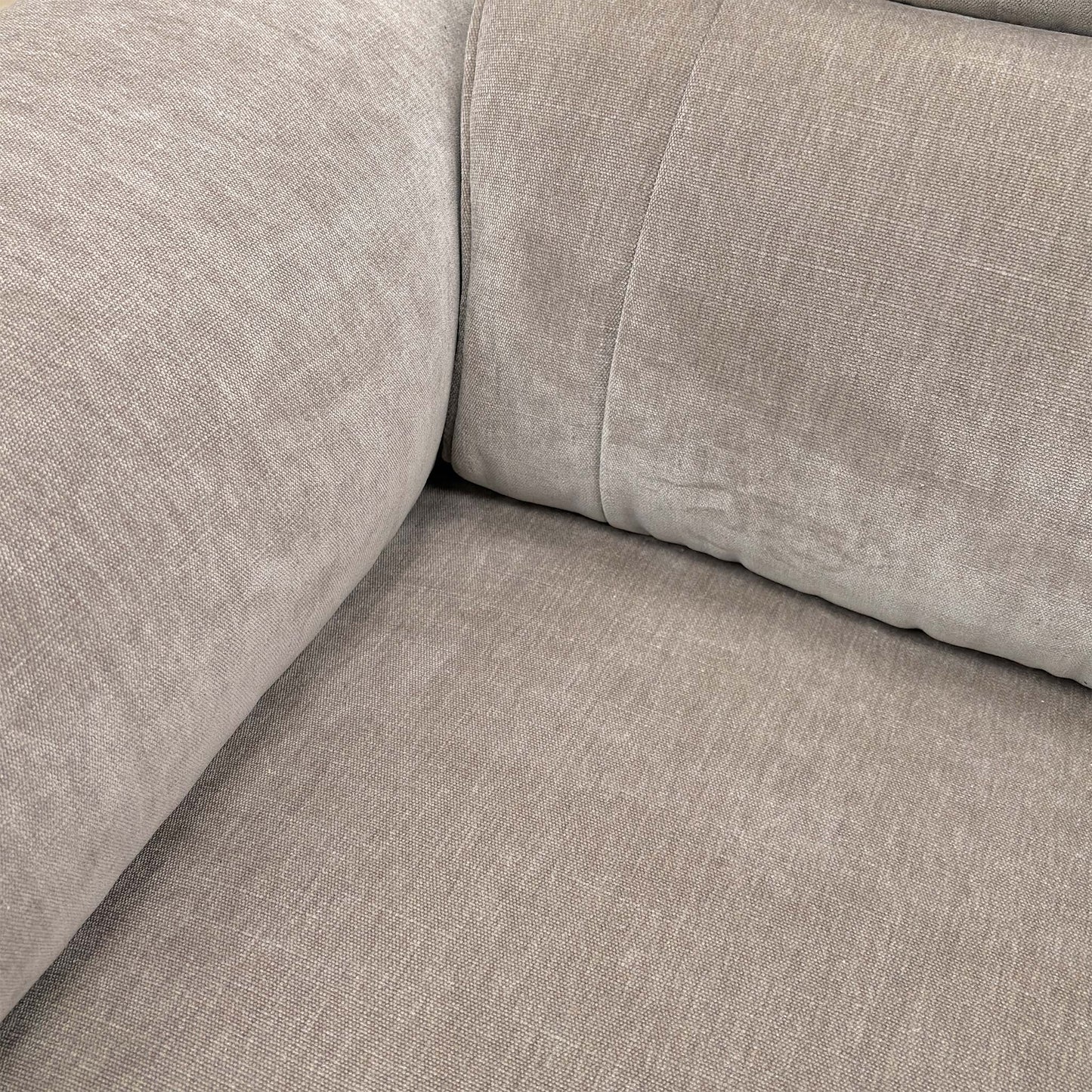 Close-up of the telescopic headrest on the 'Genius' power recliner chair.