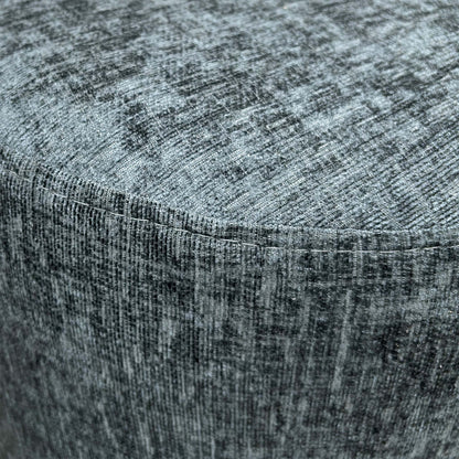 Detailed close-up of the charcoal fabric on the ‘Oslo’ footstool, illustrating the weave and material durability.