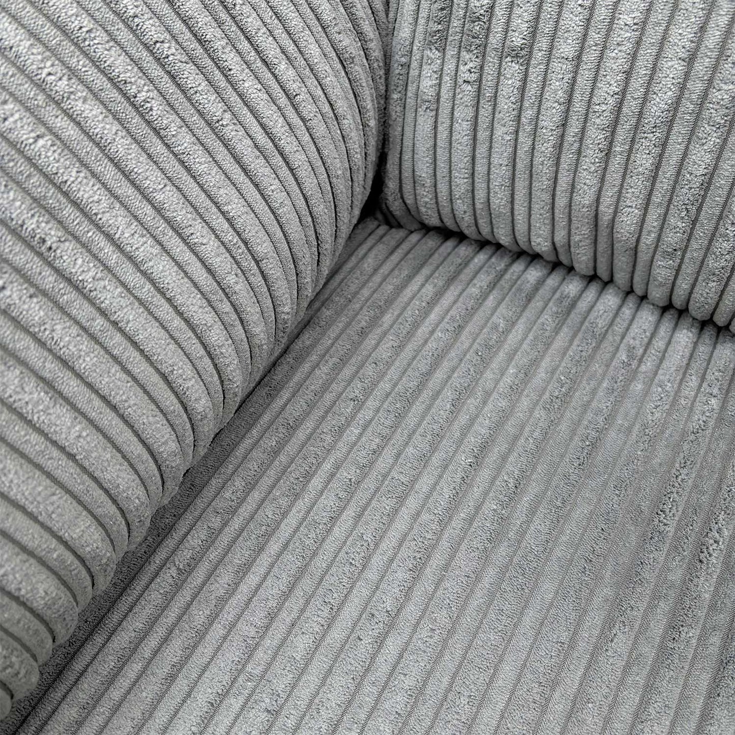 Detailed close-up of the premium grey jumbo cord material, illustrating the thick, durable ribbed texture and soft finish.