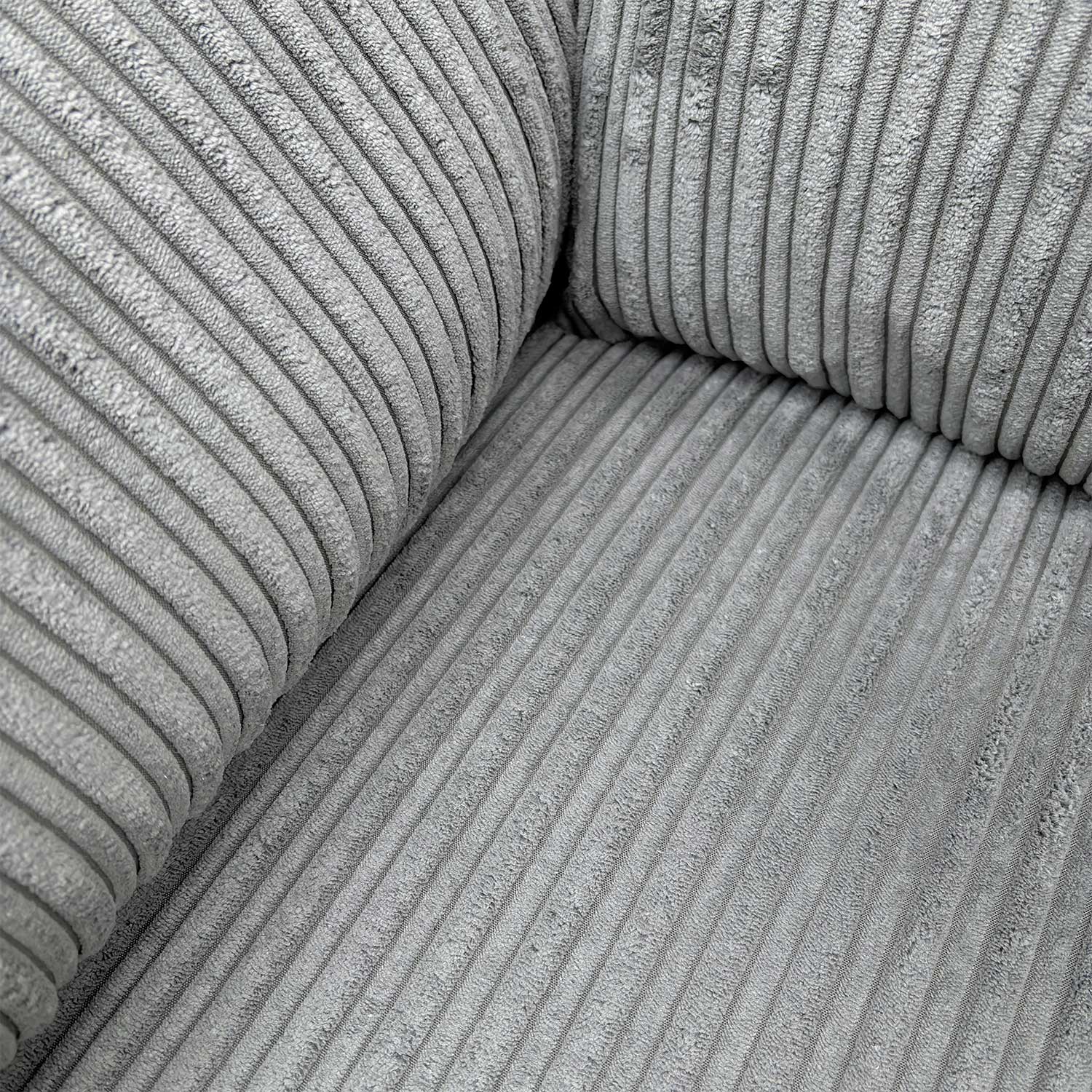 Detailed close-up of the premium grey jumbo cord material, illustrating the thick, durable ribbed texture and soft finish.