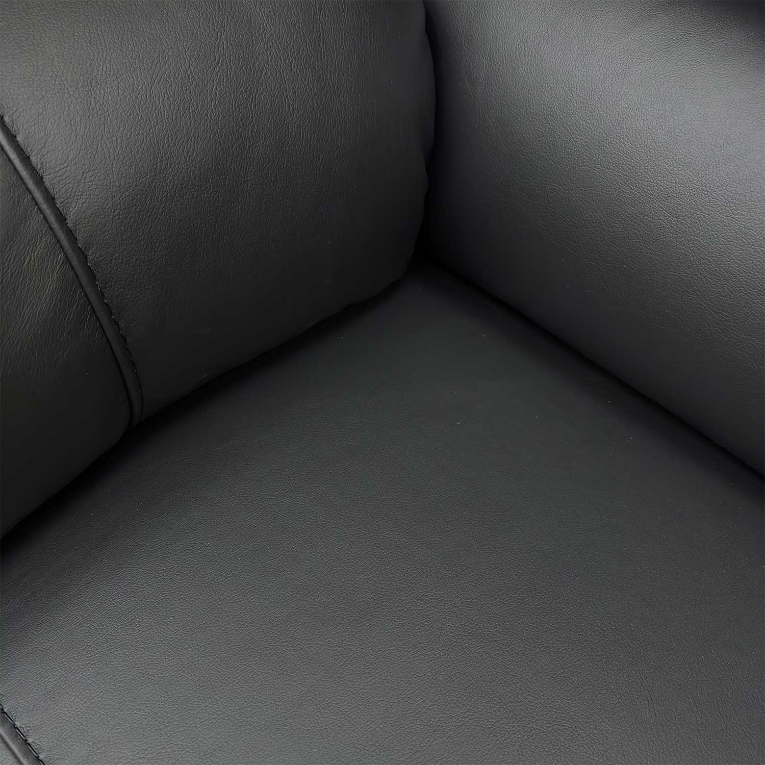 Detailed close-up of the premium black upholstery on the ‘Leighton’ sofa, showing the high-quality texture and stitching.