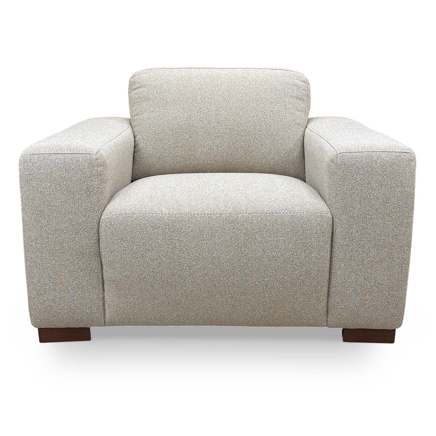 Front view of the Very Michelle Keegan Home ‘Cortes’ armchair in natural fabric, featuring a sleek, contemporary design.