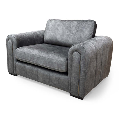Rear view of the ‘Amara’ snuggle chair, showing the clean lines and professional upholstery across the back.