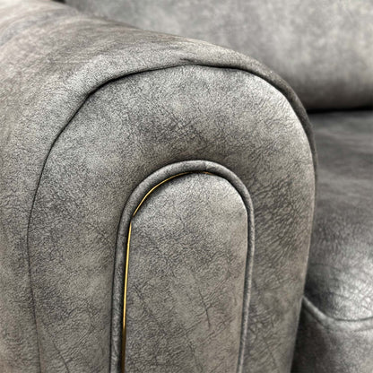 View of the plush seat and accent cushions, emphasizing the ergonomic comfort of this statement piece.