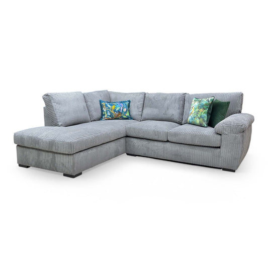 Full front view of the 'Amalfi' left-hand facing corner chaise sofa in charcoal jumbo cord fabric.