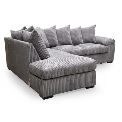 Side view of the ‘Amalfi’ corner chaise sofa, showcasing the deep seating and supportive back cushions.