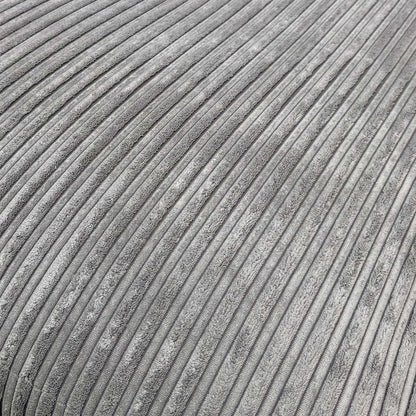 Detailed close-up of the charcoal cord fabric on the ‘Amalfi’ sofa, illustrating the durable ribbed texture and quality stitching.