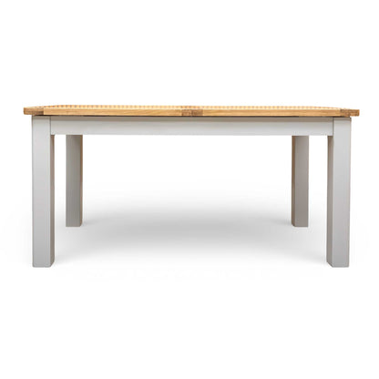 Top-down view of the ‘Lewis’ dining table fully extended, showcasing the central leaf and wood grain.