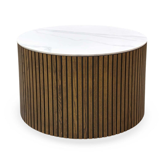 Full view of the ‘Cortado’ coffee table by Furniture Village, featuring a durable ceramic top with a matte finish and a distinctive curved fluted ash base.