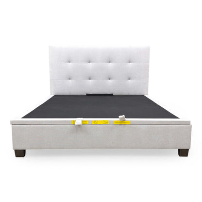 Front view of the Furniture Village ‘Hadley’ Super King Ottoman Bed Frame upholstered in textured oatmeal fabric with a tall, button-quilted headboard.