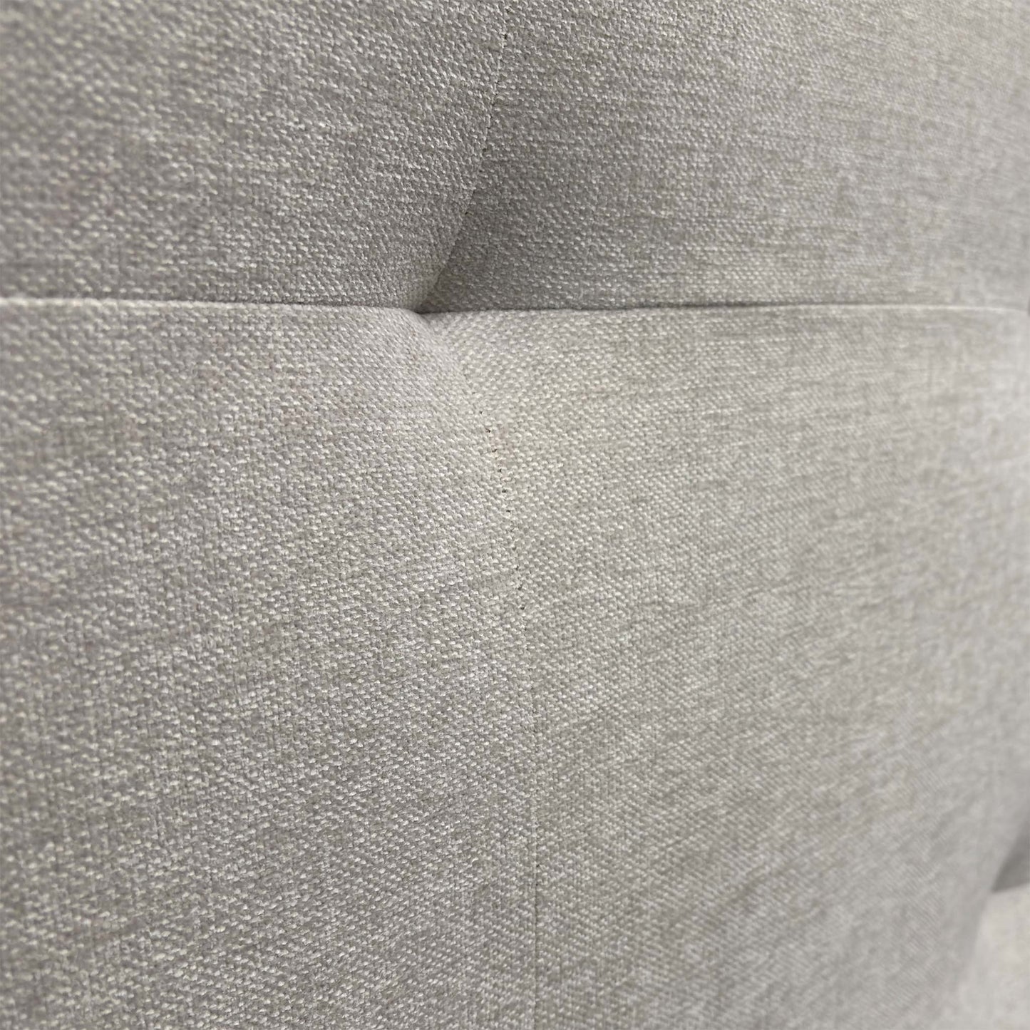 Close-up of the textured oatmeal fabric, highlighting the weave and soft neutral tone suitable for various bedroom decors.
