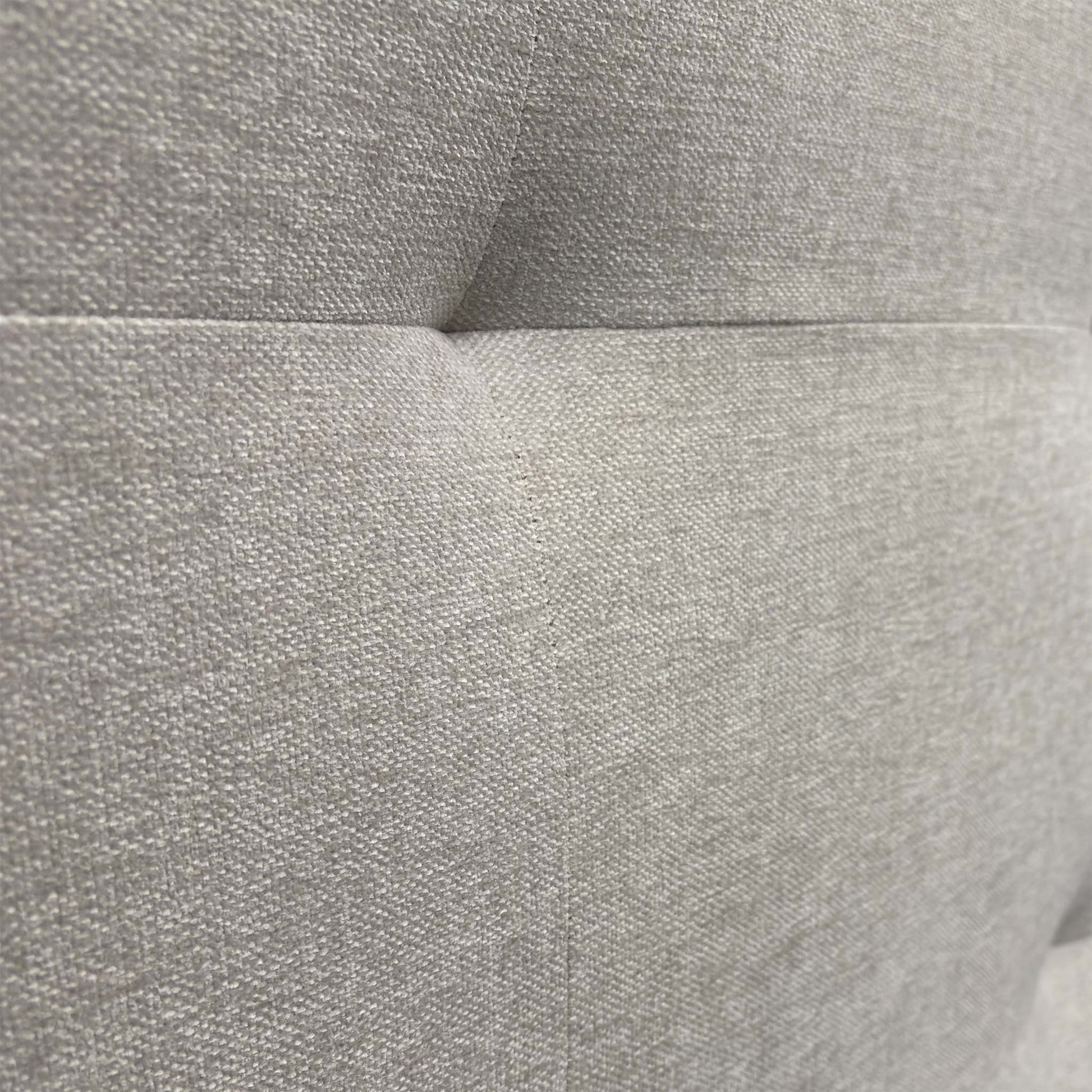 Close-up of the textured oatmeal fabric, highlighting the weave and soft neutral tone suitable for various bedroom decors.