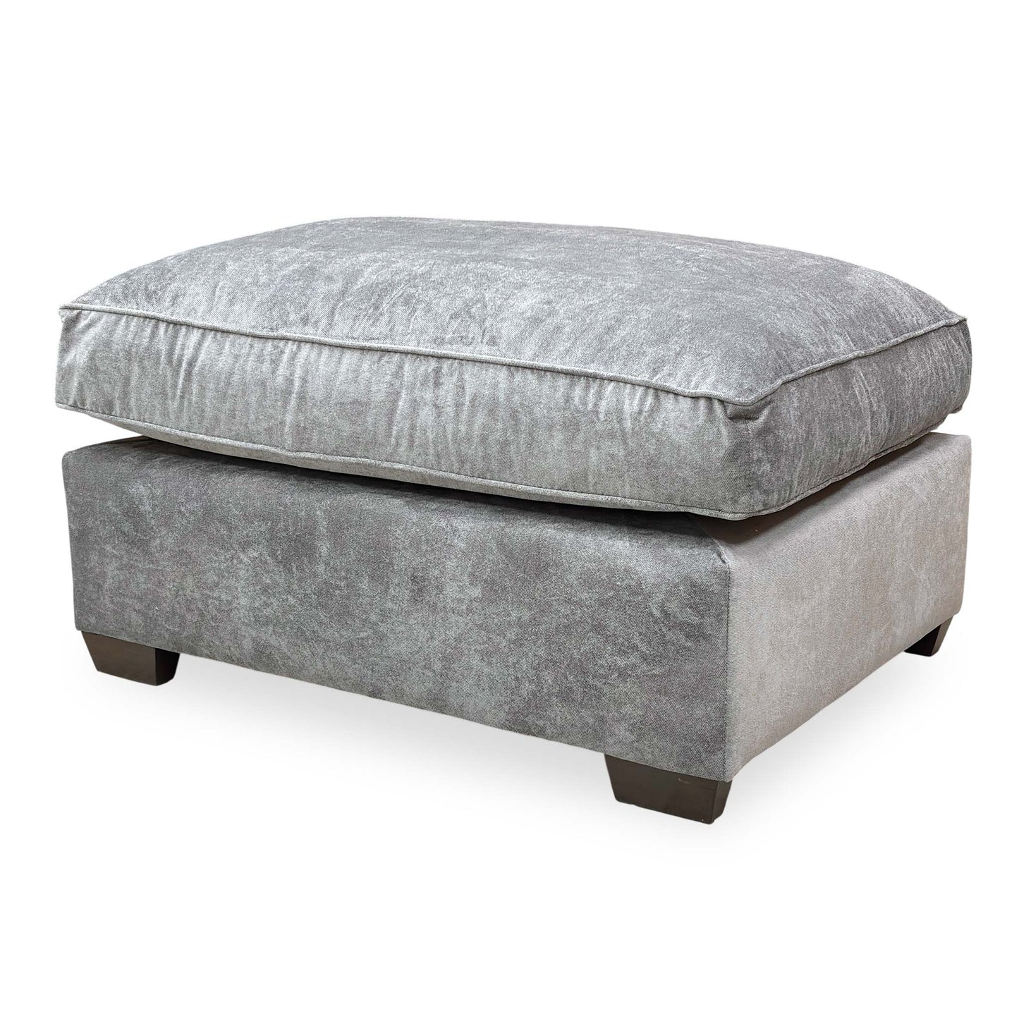 High-angle perspective view of the Kingston grey fabric footstool, highlighting the generous seating surface and soft texture.